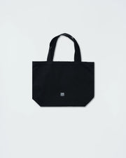 Kingz Kore Eco Bag - Side KINGZ Label Close-Up - Woven Branding on Black Canvas Material BJJ Bag