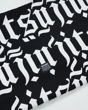 Kingz Jiu Jitsu Typo Eco Bag Black - Close-Up Detail View White Typographic Pattern Black Base Kingz Logo Patch Centered Durable Fabric Training Bag [color:Black]