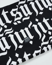 Kingz Jiu Jitsu Typo Eco Bag Black - Close-Up Detail View Bold White Typographic Pattern Kingz Logo Tag Center Durable Fabric Training Bag BJJ [color:Black]