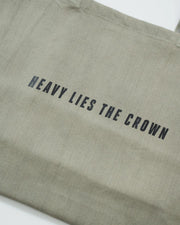Kingz Heavy Lies the Crown Eco Bag Green - Close-Up Detail View Black Text Centered Natural Fabric Texture Training Bag [color:Green]