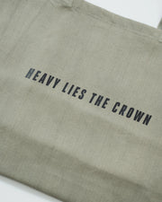 Kingz Heavy Lies the Crown Eco Bag Green - Close-Up Detail View Black Text Centered Minimalist Design Durable Fabric Training Bag [color:Green]