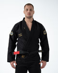 Kingz Comp 450 V6 BJJ Gi Black 2023 version front view male athlete wearing black belt on jacket