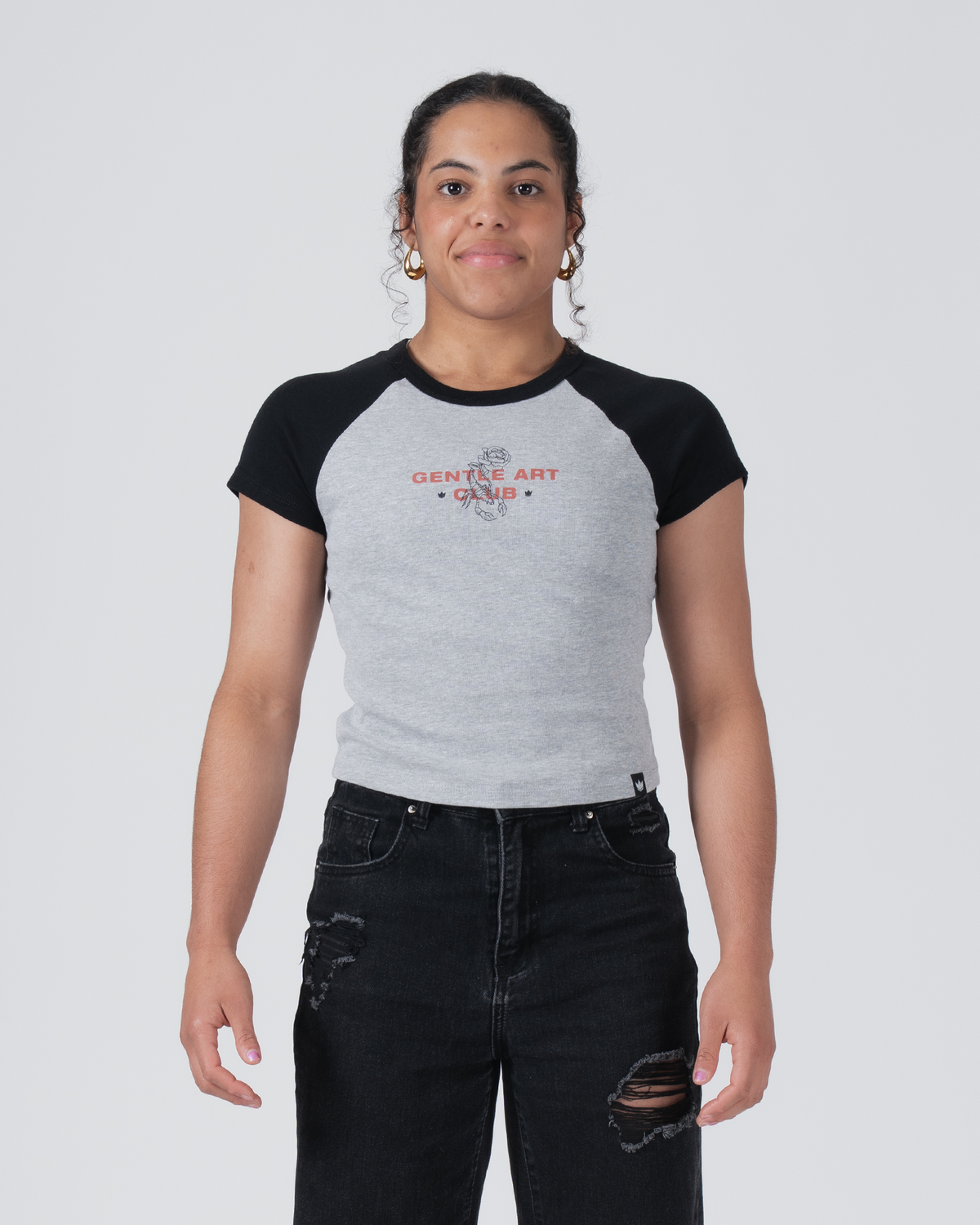 Kingz Gentle Art Club Women's Baby Tee - Worn View - Gentle Art Club Raglan Chest Graphic - Grey Women's BJJ Tee [color:Grey]