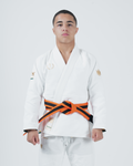 Kingz Players Special Limited Edition Youth Gi White - Full Body Front View Male Athlete Gold Crown Shoulder Embroidery Orange Black Belt Contrast Stitching Premium Fabric BJJ Gi Training [color:White]