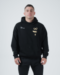 Kingz Player Special Hoodie Black - Full Body Front View Male Athlete Gold Emblem Left Chest Kingz Text Right Chest Kangaroo Pocket Ribbed Cuffs and Hem Streetwear [color:Black]