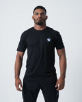 Kingz Camo Stripe Tee Black - Full Body Front View Male Athlete Black Tee Camo Crown Logo Left Chest Short Sleeve Casual Fit Streetwear [color:Black]