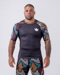 Kingz Patchwork Rashguard Black/Patchwork - Full Body Front View Male Athlete Multicolor Geometric Patchwork Sleeves White Crown Logo Chest Black Body Rash Guard BJJ Training [color:Black/Patchwork]