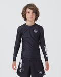 Kingz Kore V2 Youth L/S Rashguard Navy Black - Full Body Front View Teen Boy Athlete Long Sleeve Navy Blue Minimal Design White Crown Logo Circle Chest KINGZ White Sleeve Text Matching Navy Shorts Kids BJJ Training [color:Black]