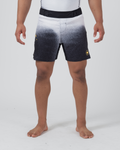 Kingz Galaxy Performance Series Shorts Black White - Full Body Front View Male Athlete Black White Galaxy Fade Gradient Pattern White Top Fading to Black Bottom Gold Crown Logo Right Thigh Black Elastic Waistband Competition Cut Men's Grappling Shorts No-Gi BJJ [color:Black/Galaxy]