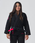 Kingz Ultralight 2.0 Women's Jiu Jitsu Gi Black - Front View Female Athlete Black Gi Pink Crown Embroidery Shoulder Pink Ultralight Text Waist Black Belt Durable Weave BJJ Gi [color:Black]