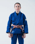 Kingz The ONE V2 Women's Jiu Jitsu Gi Blue - Full Body Front View Female Athlete Blue Gi Crown Badge Left Arm KINGZ Logo Bottom Hem Contrast Stitching Durable Fabric BJJ Gi [color:Blue]