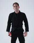 Kingz Born to Rule Jiu Jitsu Gi - Black - Front View Male Athlete Black Gi Red Tip Belt Minimalist Design Durable Fabric BJJ Gi [color:Black]