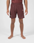 Kingz Trooper Shorts Maroon - Full Body Front View Male Athlete Maroon Burgundy Color KINGZ Badge Right Thigh Flag Badge Left Leg Inner Compression Shorts Gray Trim Competition Cut Men's Grappling Shorts No-Gi BJJ [color:Maroon]
