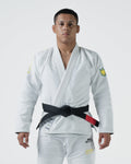 Kingz MI-K Roots Gi - White - Full Body Front View Male Athlete White Gi Black Belt Yellow Crown Badge Shoulder MI-K ROOTS Text Pants BJJ Training Gi [color:White]