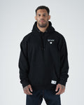 Kingz Leandro Lo Respect Hoodie - Front View - Chest Logo Worn by Male Model - Black - BJJ Lifestyle Hoodie [color:Black]