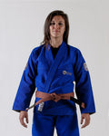 Kingz Balistico 2.0 Women's Jiu Jitsu Gi Blue - Front View Female Athlete Blue Gi Embroidered Kingz Logo Chest and Sleeve Brown Belt Contrast Stitching Durable Fabric BJJ Kimono Training