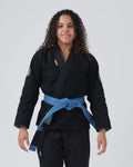 Kingz Balistico 4.0 Women's Jiu Jitsu Gi - Black - Front View Female Athlete Black Gi White Crown Badge Left Sleeve Embroidered Patches Brown Belt Contrast Modern Fit BJJ Gi Training [color:Black]