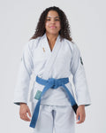 Kingz Balistico 4.0 Women's Jiu Jitsu Gi White - Front View Female Athlete White Gi Blue Belt Green Patch Left Waist Black Patch Left Sleeve Durable Fabric BJJ Gi Training [color:White]