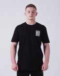 Kingz Solo Tee Black - Front View Male Athlete Black Tee White Rectangular Chest Patch Text Minimalist Design Streetwear [color:Black]